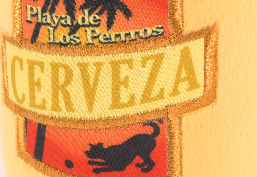 P.L.A.Y. Tropical Paradise Collection - Canine Cerveza Toy close-up of label