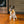 Load image into Gallery viewer, Small dog with mini Cinna-bone toy hanging out of mouth from Pup Cup Cafe Collection by P.L.A.Y.
